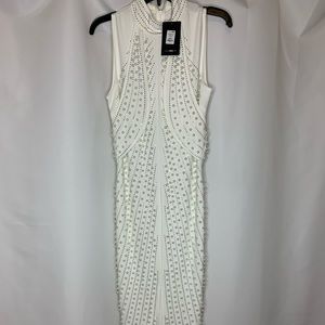 Bedazzled ankle length gown. Never worn with tag.